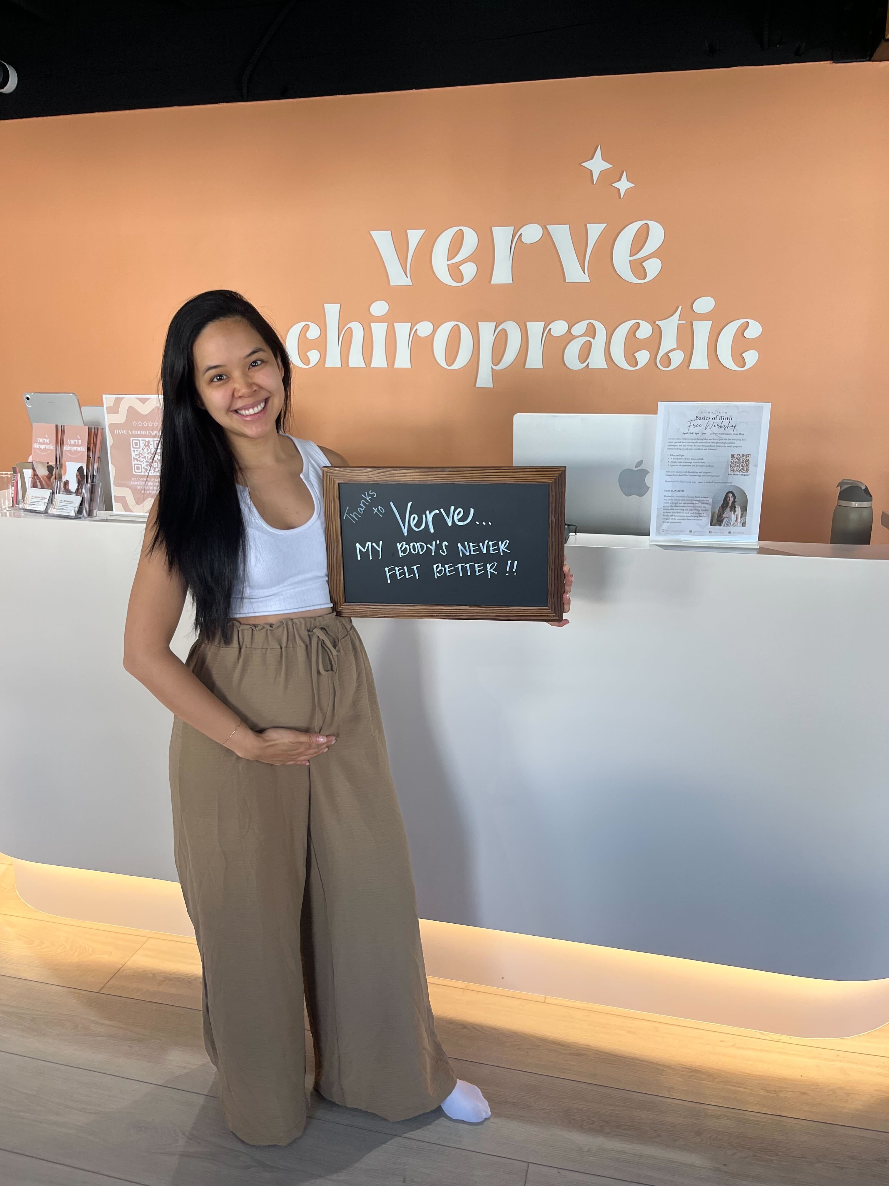 Pregnant mama at Verve holding chalkboard: My body's never felt better